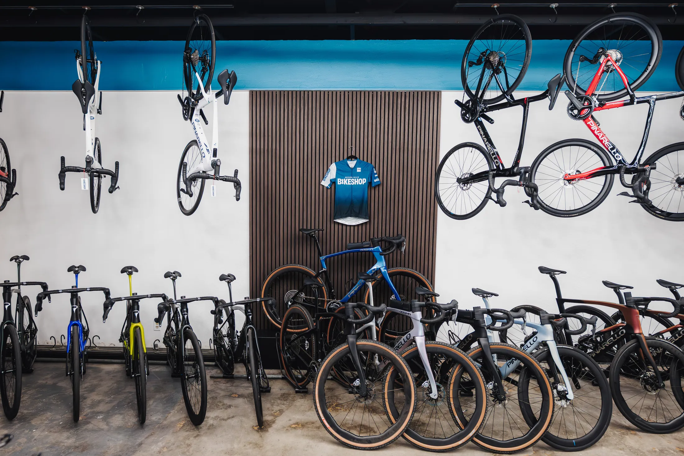 Pinarello bikes and the shop kit on the wall at Agoura Hills Bikeshop